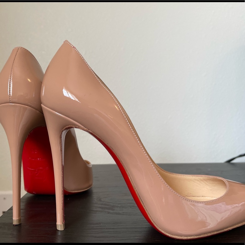 Louboutin heels, size 7